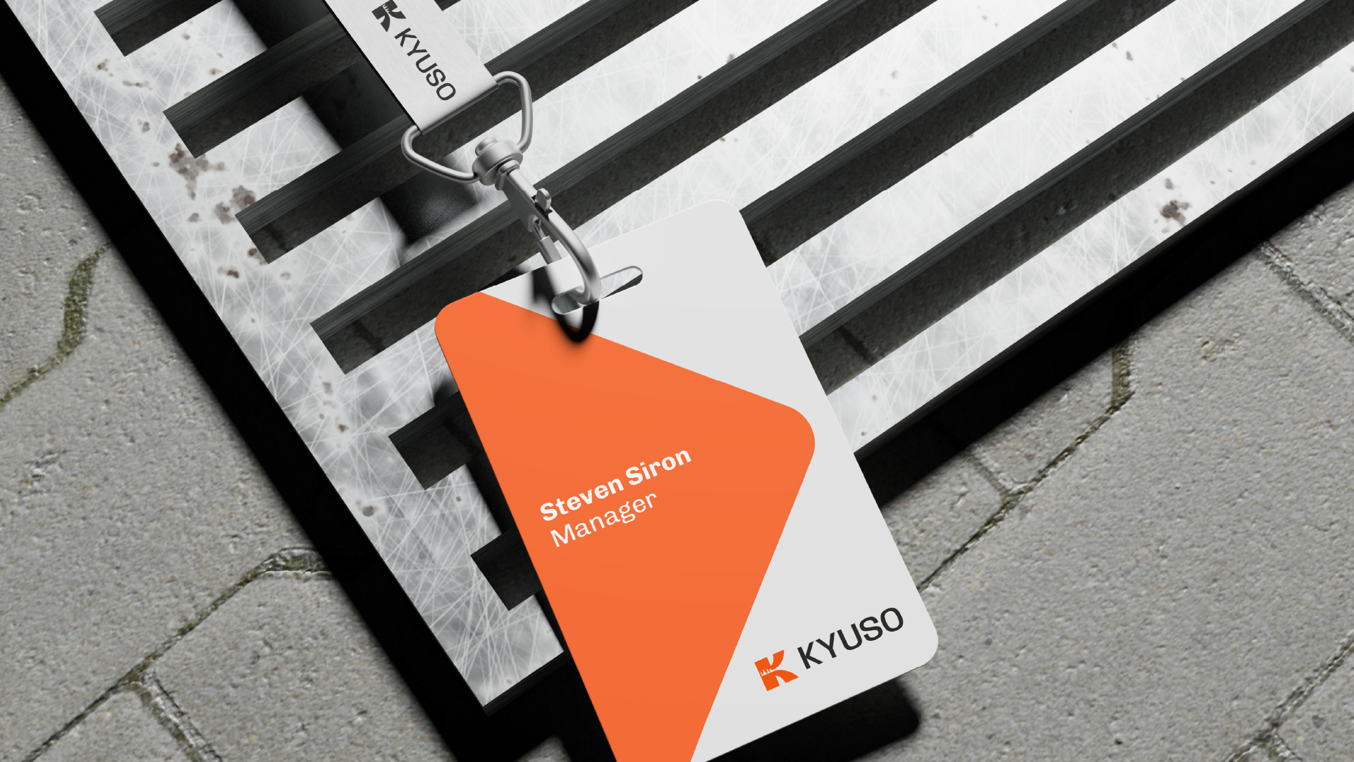 Kyuso employee ID badge and lanyard as part of the brand identity system
