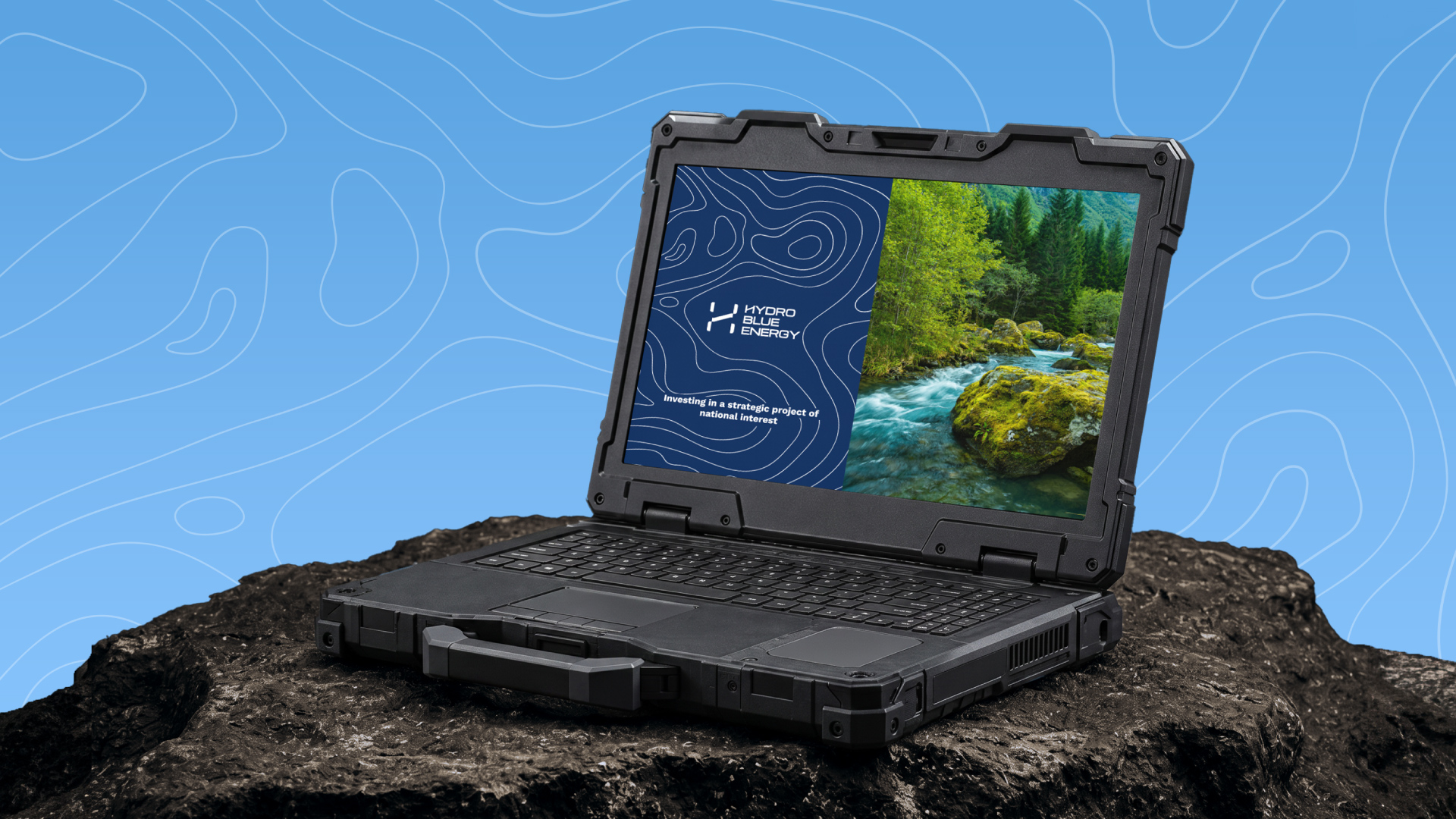 Hydro Blue Energy brochure design displayed on a rugged laptop